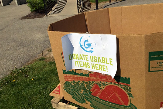 a box with a sign that says, "donate usable items here".