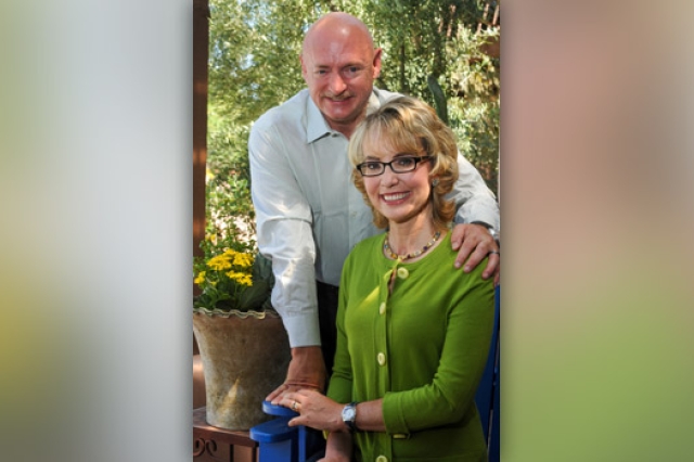 Astronaut and Representative posing for camera