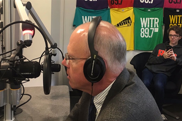 President Munson speaking on the radio.