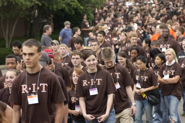 New RIT students walking along path