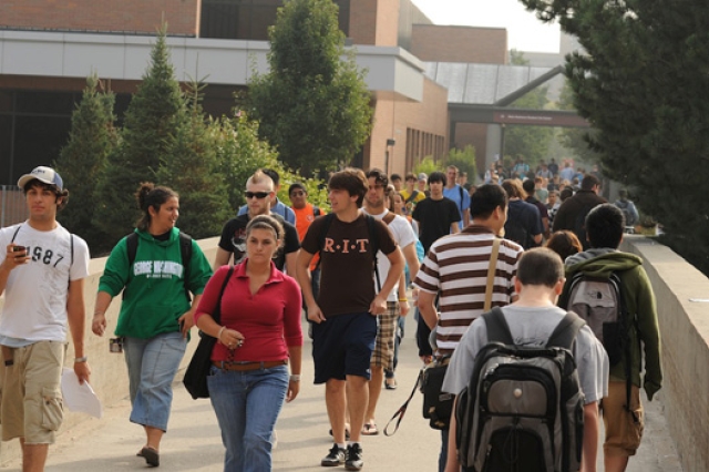 People walking down pathway