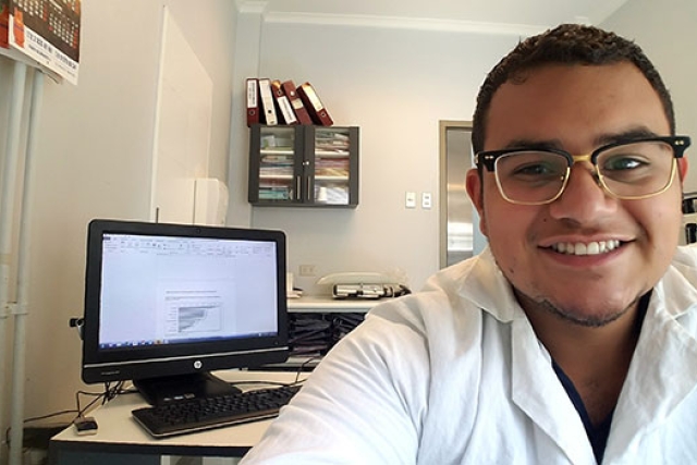 A selfie of Luis Reyes-Umana in an office at a hospital in Chile.