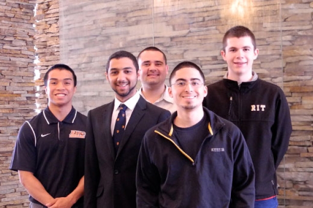 Five people gathered for picture 