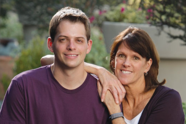 Student posing with Family