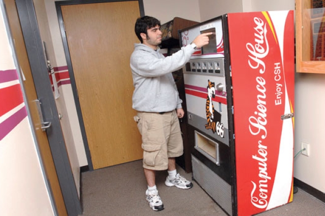Person ordering from vending machine