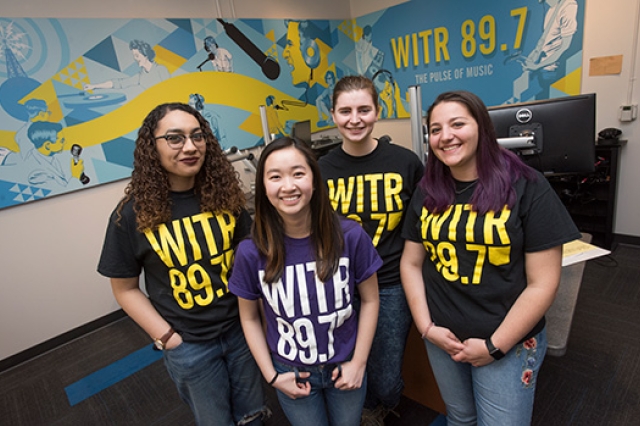 People posing in studio