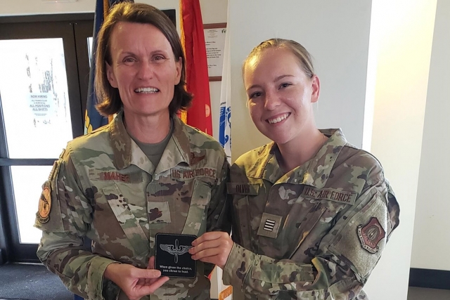 Air Force Brigadier General and an Air Force ROTC Cadet.