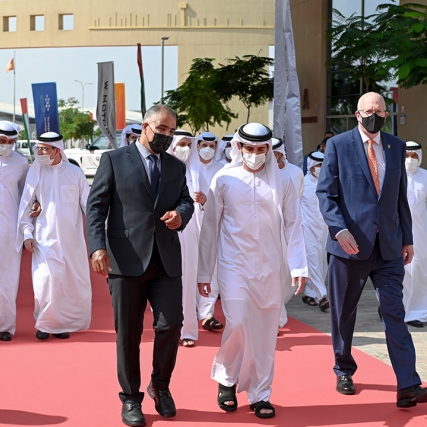 group of men walking on the campus of RIT Dubai.