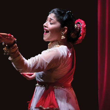 student performing traditional Indian dance.