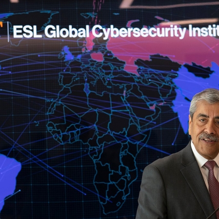 man standing in front of a map of the world with the words RIT ESL Global Cybersecurity Institute.