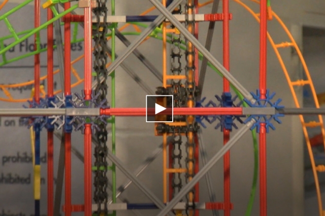 A close-up shot of a colorful miniature roller coaster ride.