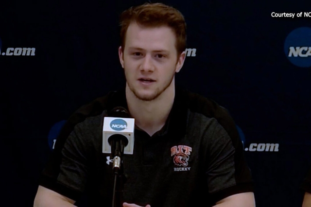 Caleb Moretz is shown talking to the press at the NCAA Tournament.