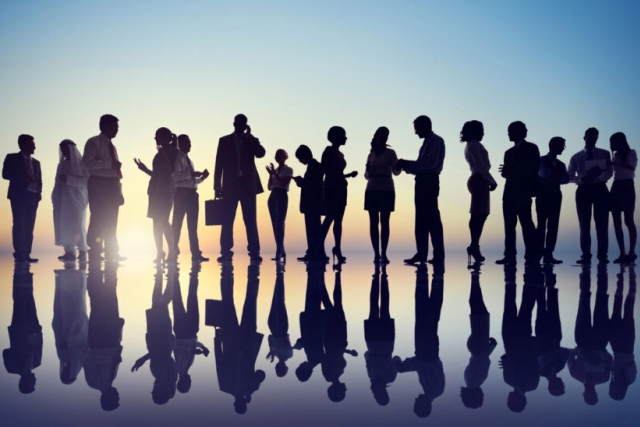 silhouettes of adults in business attire are shown against a light blue background.