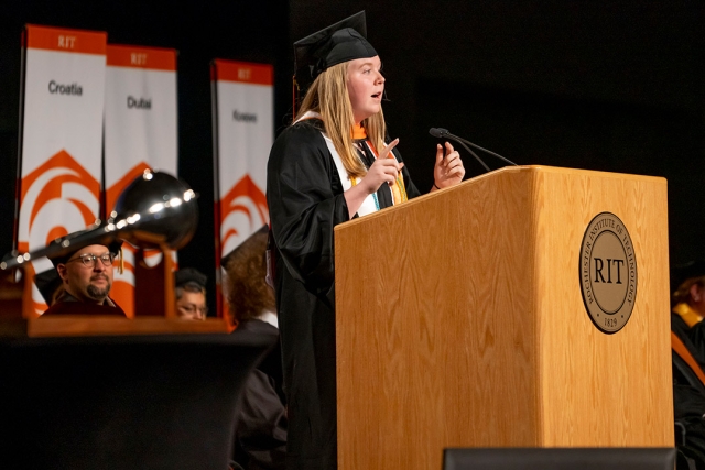 Student Government President Darcie Jones addresses the crowd at the Gordon Field House.