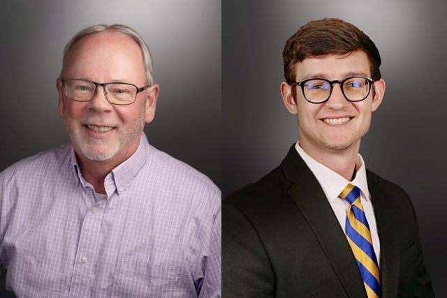 "Side-by-side professional portraits of two men against a gradient gray background. The older man on the left has short gray hair, glasses, a beard, and wears a light purple checkered shirt. The younger man on the right has short brown hair, glasses, and wears a black suit, white shirt, and a blue and yellow striped tie. Both are smiling.