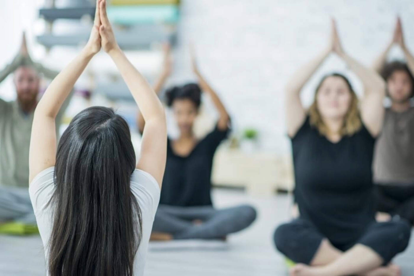 A photo of people during a yoga session