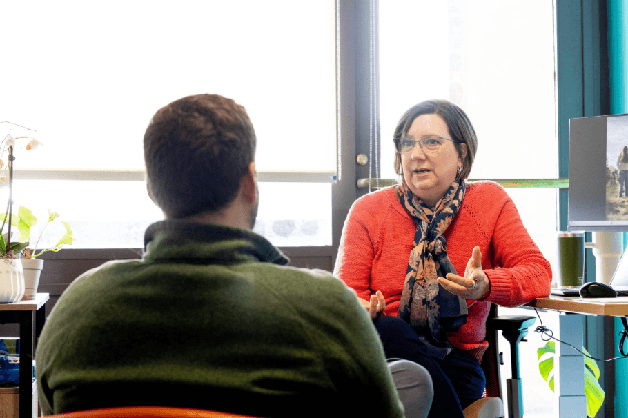 A student speaks with a staff member at the student conduct and conflict resolution office