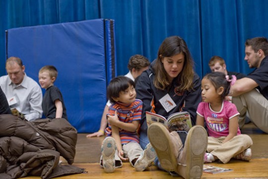 People reading books to kids