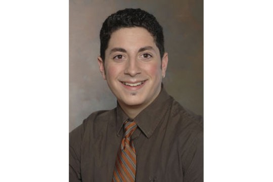 Professor posing for camera