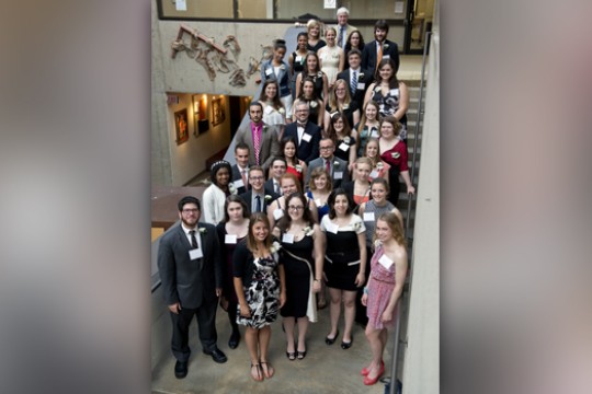 People gathered for picture on staircase