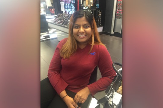 Person posing for camera in store