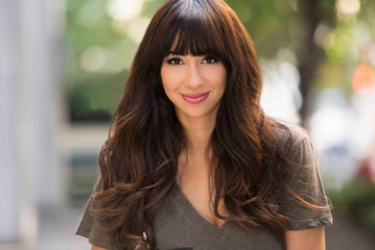 Actress posing for camera