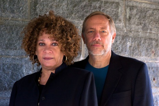 Two people posing for camera