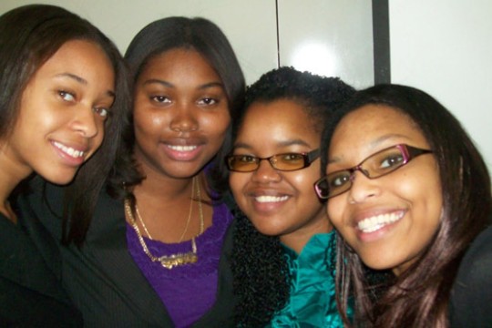 People posing for camera