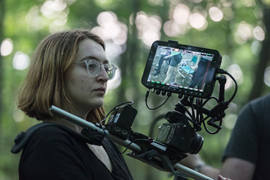 Emily Kordovich behind a camera.