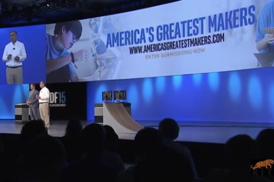 Person speaking on stage at event