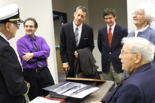 People speaking at event