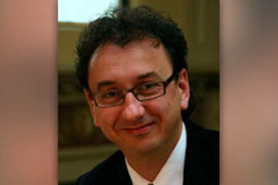 Professor posing for camera