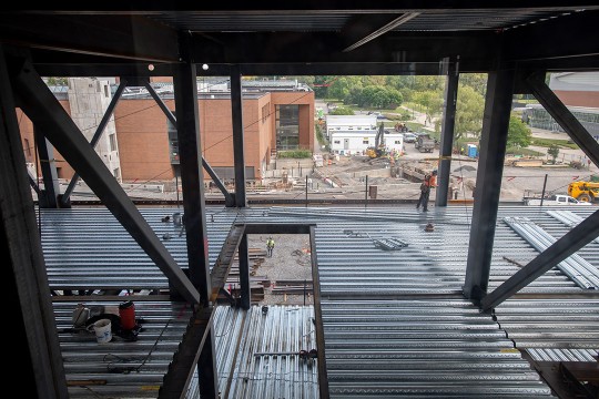 construction project with steel beams and corrugated metal.