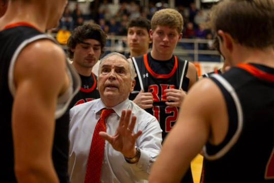 Former RIT Men’s Basketball head coach Bob McVean talks to his team during a game against Nazareth College on November 18, 2023 at St. John Fisher College in Rochester, New York. McVean, who coached the Rochester Institute of Technology men’s basketball team for 40 years prior to his retirement in 2024, was inducted into the Basketball Coaches Association of New York (BCANY) Hall of Fame earlier this month.