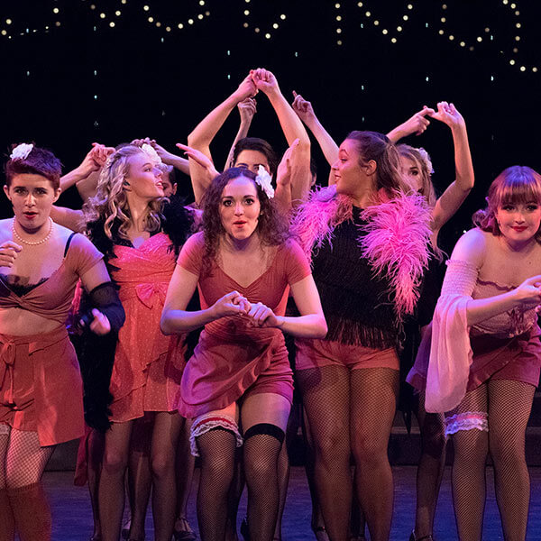 Actors on stage at the Panara Theatre