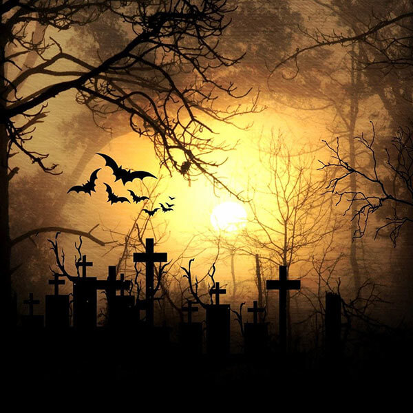 Painting of a graveyard with bats flying at night
