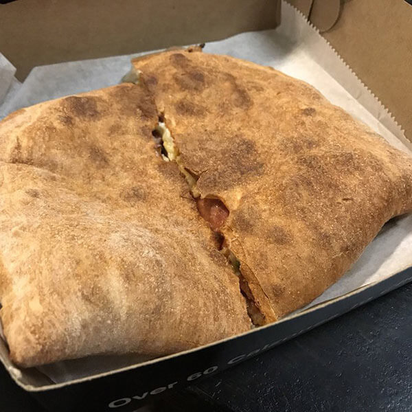 A calzone from D.P. Dough