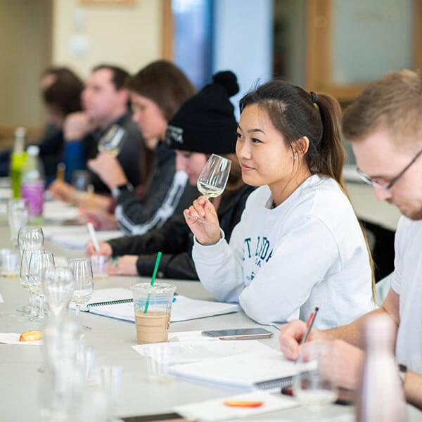 RIT students taste testing wine as part of the Wines of the World course