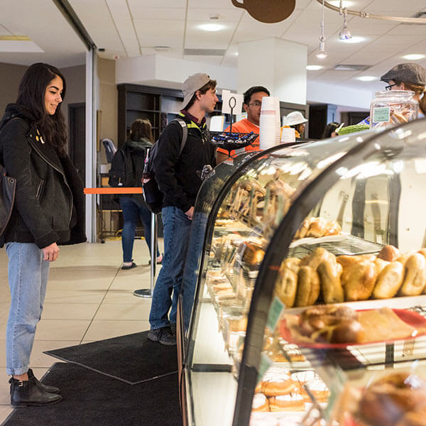 RIT students in line at Artesano Bakery and Café