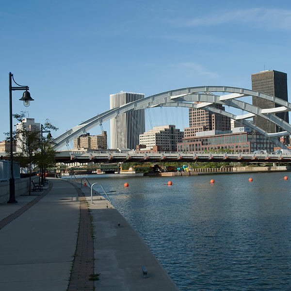 A view of the Rochester skyline from the Genesee Riverway Trail