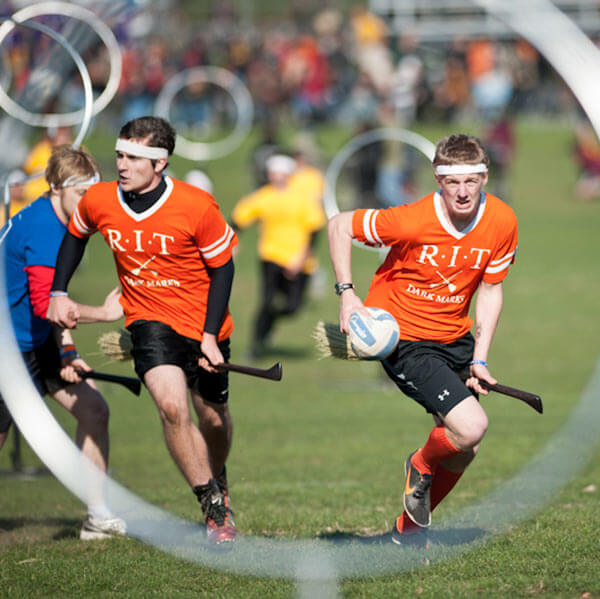 Members of the RIT Quidditch team during a match