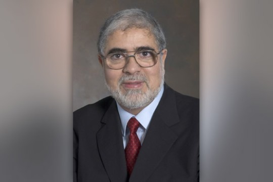 Professor posing for camera