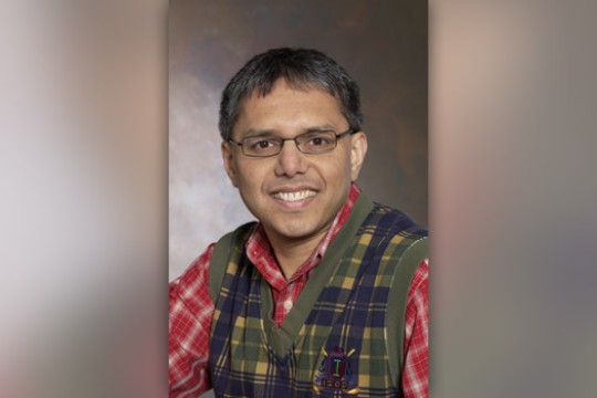 Professor posing for camera