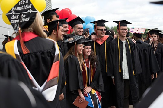 Graduates posing for picture 