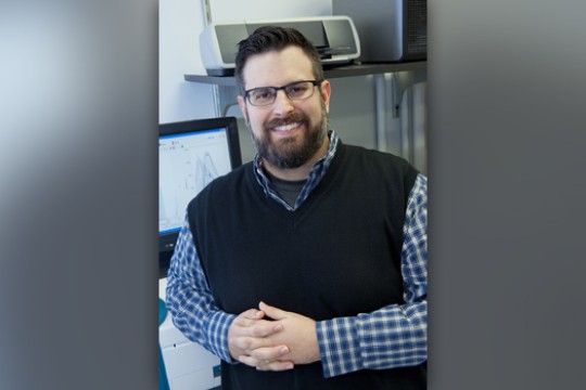 Professor posing for camera