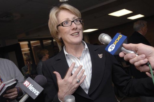 Person talking to news reporters