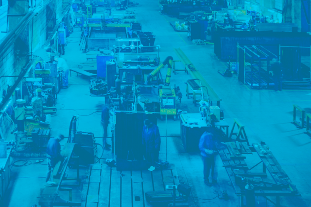 Image of people in a manufacturing warehouse with a blue overlay