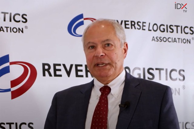 screenshot of person talking in front of a backdrop for the Reverse Logistics Association.