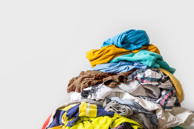 a pile of clothing is shown in front of a white background.