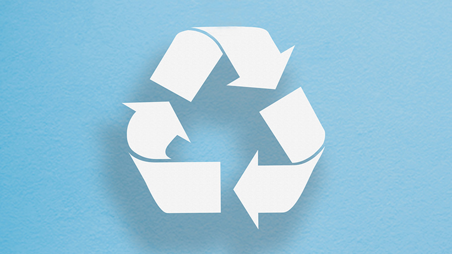 A white recycling symbol is displayed on a textured light blue background.